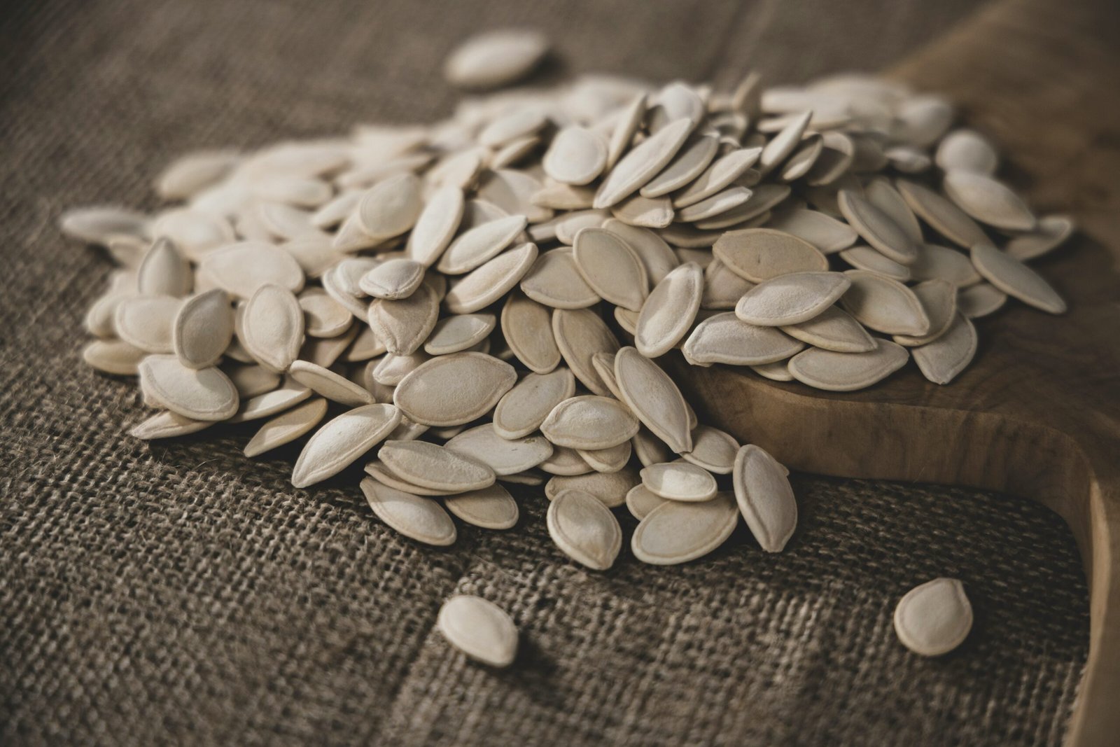 Pumpkin seeds and nuts — magnesium-rich foods that help prevent magnesium deficiency symptoms